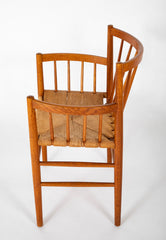 A Jorgen Baemark for FDB Mobler Oak Framed Armchair with Papercord Seat