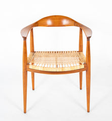 Four Danish Dining Chairs with Arms in the Style of Hans Wegner     Priced Individually at $1,500 EACH