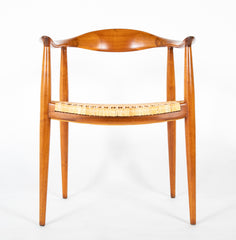 Four Danish Dining Chairs with Arms in the Style of Hans Wegner     Priced Individually at $1,500 EACH