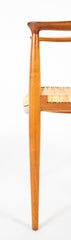 Four Danish Dining Chairs with Arms in the Style of Hans Wegner     Priced Individually at $1,500 EACH