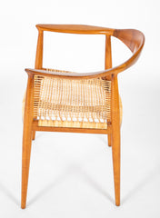 Four Danish Dining Chairs with Arms in the Style of Hans Wegner     Priced Individually at $1,500 EACH