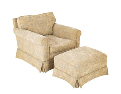 A Current Upholstered Armchair with Matched Ottoman