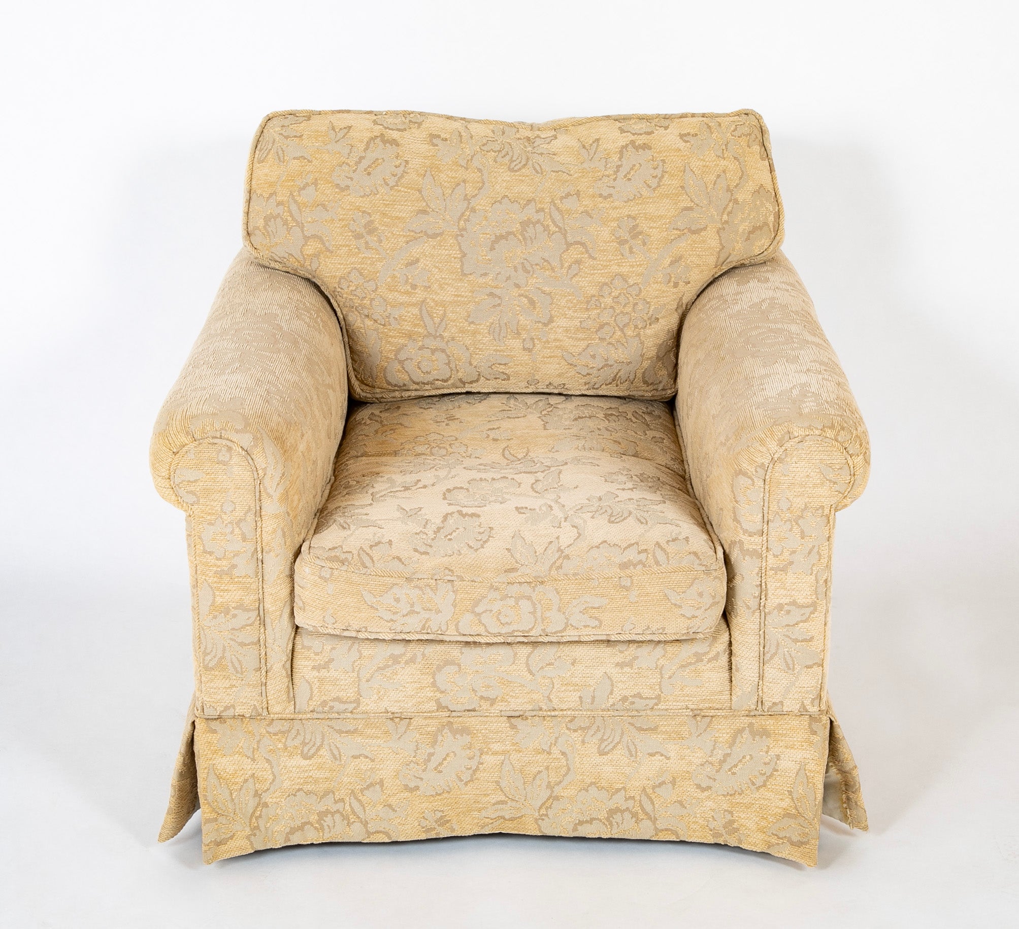 A Current Upholstered Armchair with Matched Ottoman