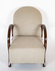 A Pair of Jacques Adnet Beech Armchairs with Circle Arms