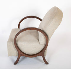 A Pair of Jacques Adnet Beech Armchairs with Circle Arms