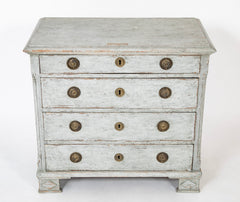 A Louis XVI White Painted Four Drawer Chest