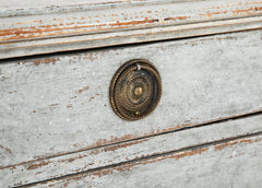 A Louis XVI White Painted Four Drawer Chest