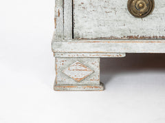 A Louis XVI White Painted Four Drawer Chest