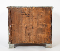 A Louis XVI White Painted Four Drawer Chest