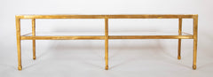 A Contemporary Two Tiered Glass and Gilt Metal Coffee Table