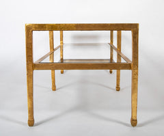 A Contemporary Two Tiered Glass and Gilt Metal Coffee Table