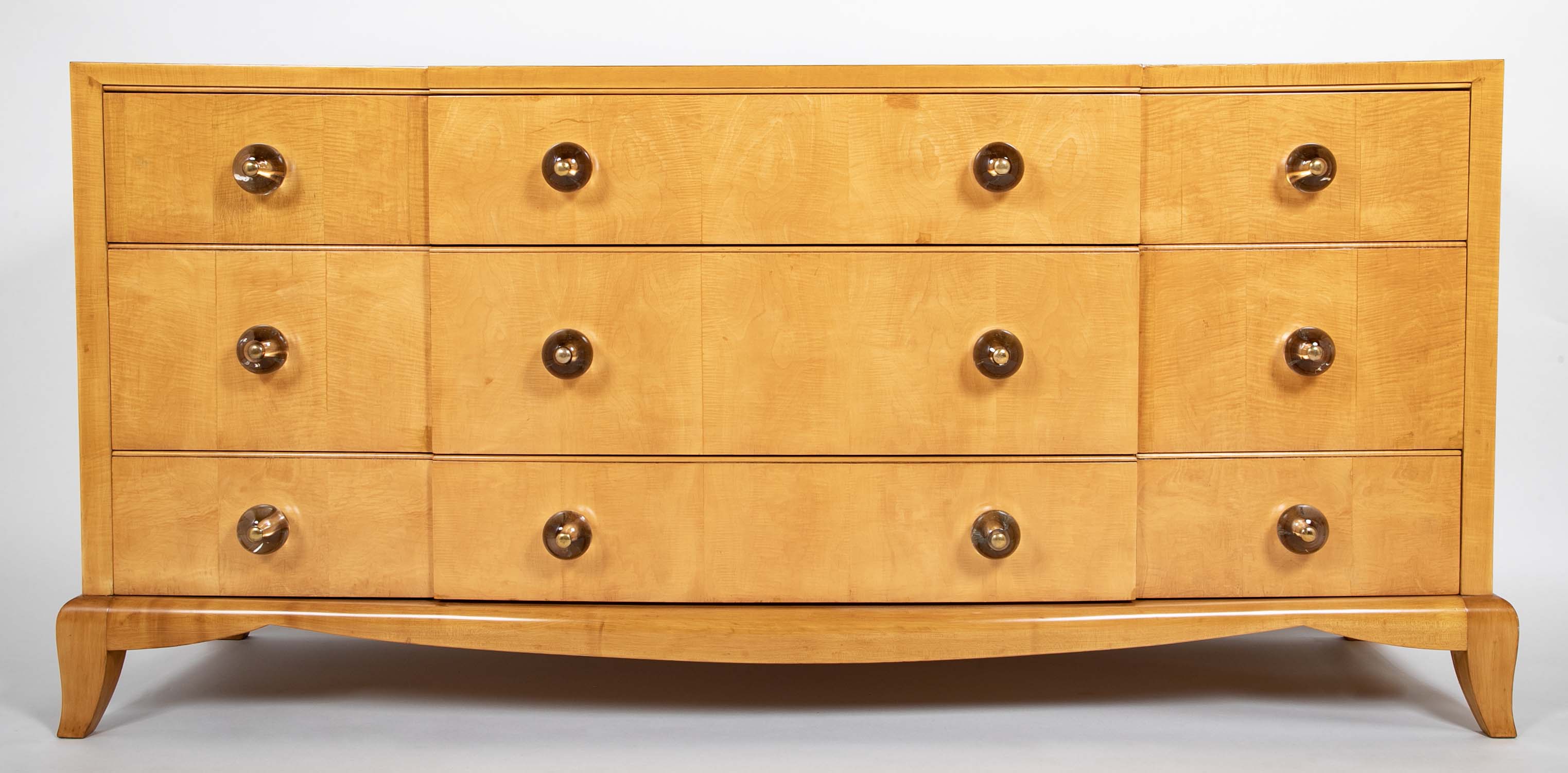 A French Sycamore Veneered Chest of Drawers Attributed to Andre Arbus