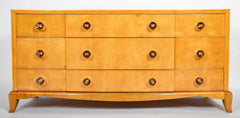 A French Sycamore Veneered Chest of Drawers Attributed to Andre Arbus