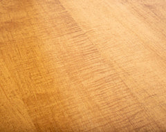 A French Sycamore Veneered Chest of Drawers Attributed to Andre Arbus