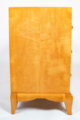 A French Sycamore Veneered Chest of Drawers Attributed to Andre Arbus