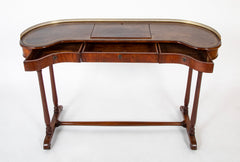 An English Regency Kidney Shaped Mahogany Desk