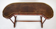 An English Regency Kidney Shaped Mahogany Desk