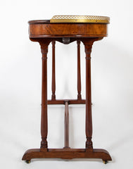 An English Regency Kidney Shaped Mahogany Desk