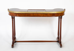 An English Regency Kidney Shaped Mahogany Desk