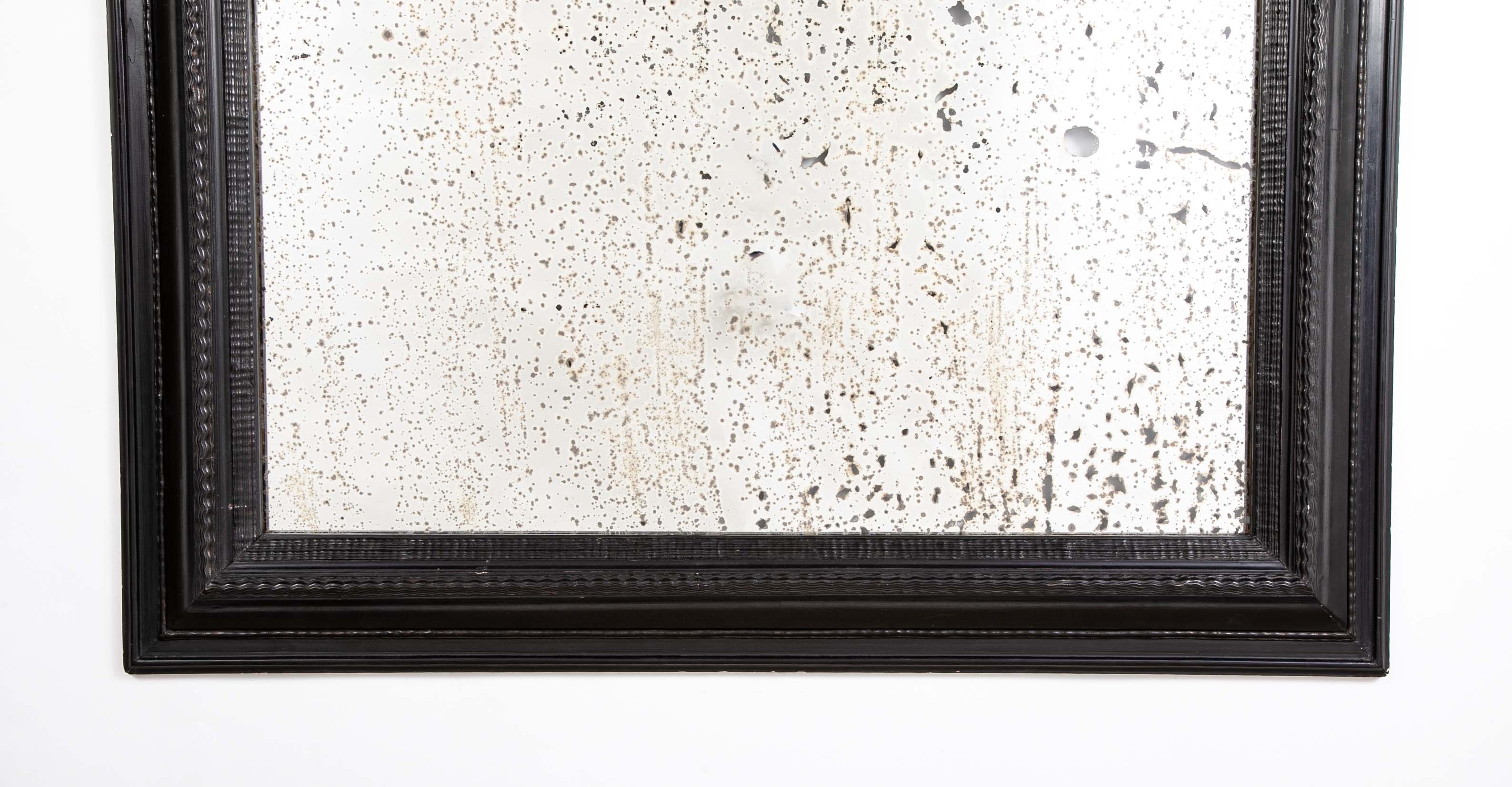 A Late 19th Century Dutch Ebonized Ripple Mirror