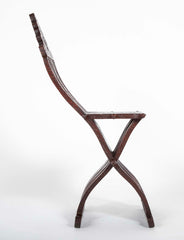 A Syrian Carved Hardwood Folding Chair with Abalone Inlays
