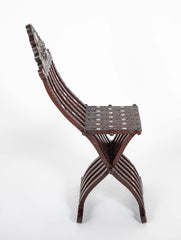 A Syrian Carved Hardwood Folding Chair with Abalone Inlays