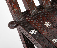 A Syrian Carved Hardwood Folding Chair with Abalone Inlays