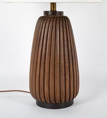 An Elongated Melon Shaped Wooden Lamp