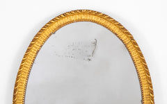 Oval French Mirror with Carved Gilt Wood Frame