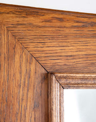 Early 20th Century French Natural Form Molded Oak Framed Mirror