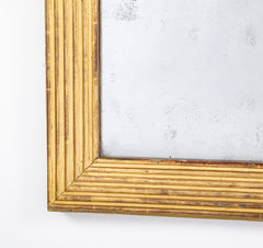 A French Louis XVI Gilt Mirror