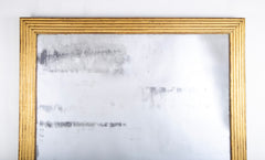 A French Louis XVI Gilt Mirror