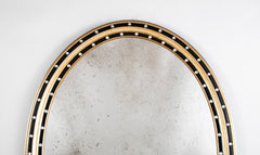 An Irish Ebonized & Parcel Gilt Oval Mirror with Faceted Bead Decoration