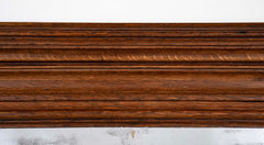 A 19th Century French Patinated Oak Framed Mirror