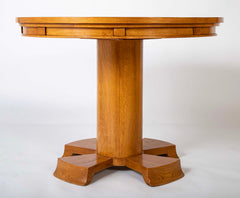 A Oak Expandable Dining Table In The Manner of Jules Leleu