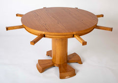 A Oak Expandable Dining Table In The Manner of Jules Leleu
