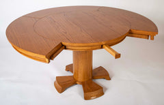 A Oak Expandable Dining Table In The Manner of Jules Leleu