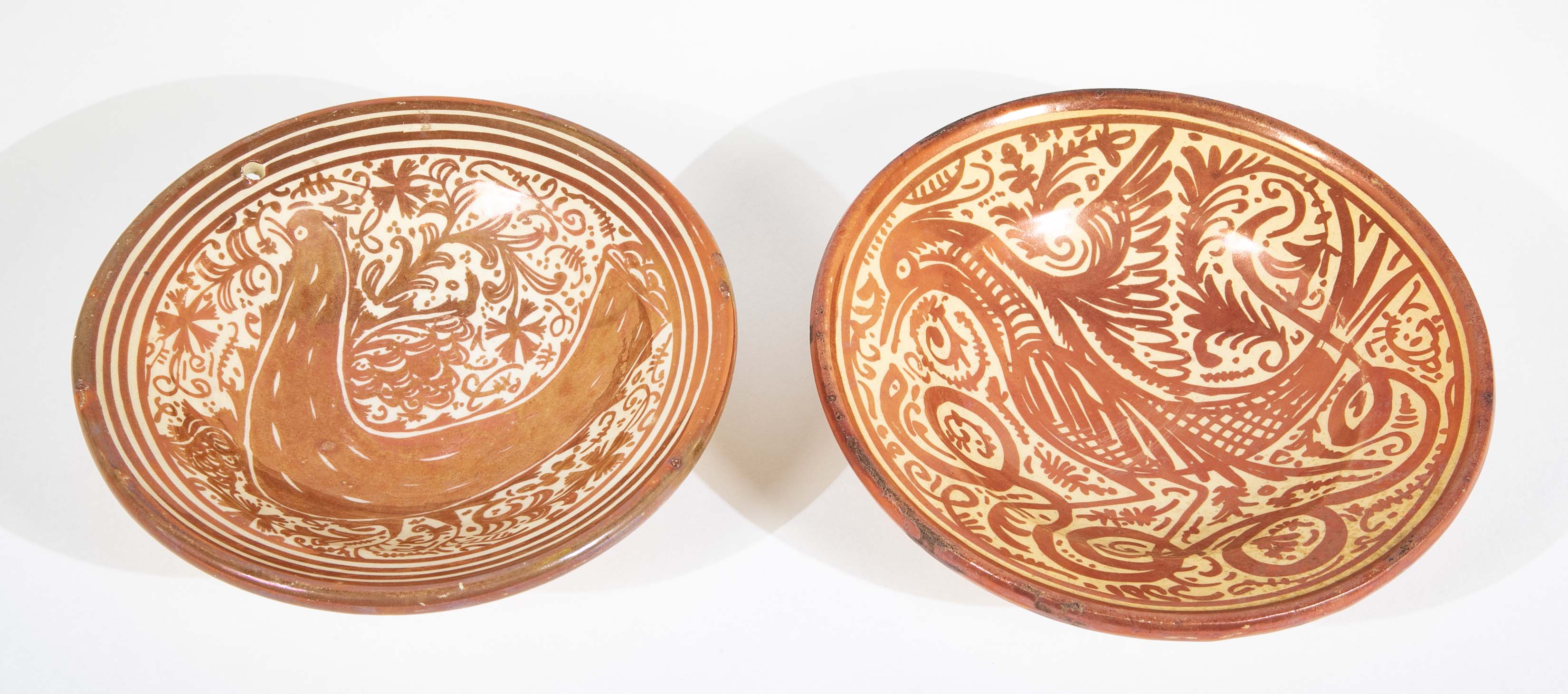 Two Copper Lustre Plates with Highly Stylized Birds