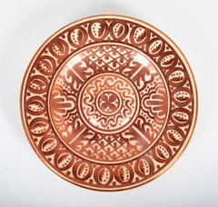 Two Round Copper Lustre Plates with Stylized X Design