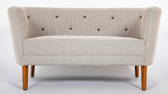 Pair of Mid-Century Danish Upholstered Loveseats on Stained Beech Legs
