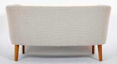 Pair of Mid-Century Danish Upholstered Loveseats on Stained Beech Legs