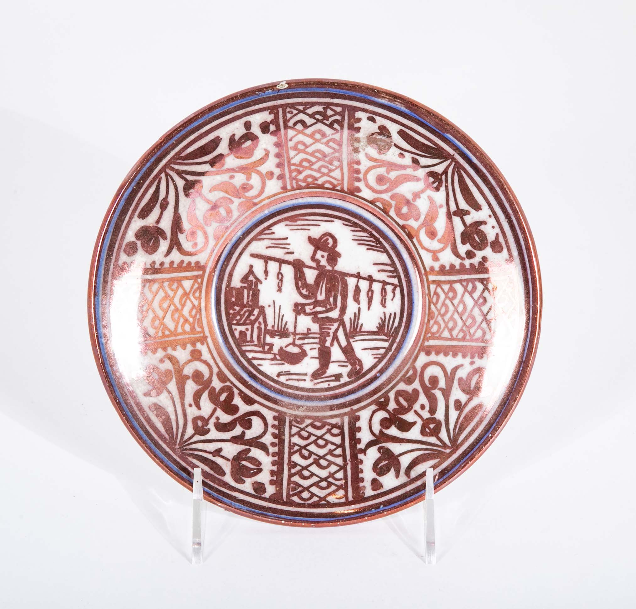 Ruby Lustre Ware Plate with Man Carrying Bird on a Stick