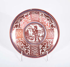Ruby Lustre Ware Plate with Man Carrying Bird on a Stick