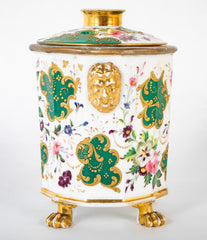 A Paris Porcelain Bulb Pot with Satyr Head Handles & Floral Decor