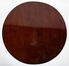 Pair of Round Mahogany Side Tables Attributed to Jacques Quinet