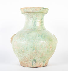 Han Dynasty Pottery Jar with Green Glaze and Molded Masks as Applied Handles