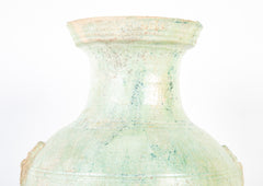 Han Dynasty Pottery Jar with Green Glaze and Molded Masks as Applied Handles