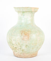 Han Dynasty Pottery Jar with Green Glaze and Molded Masks as Applied Handles