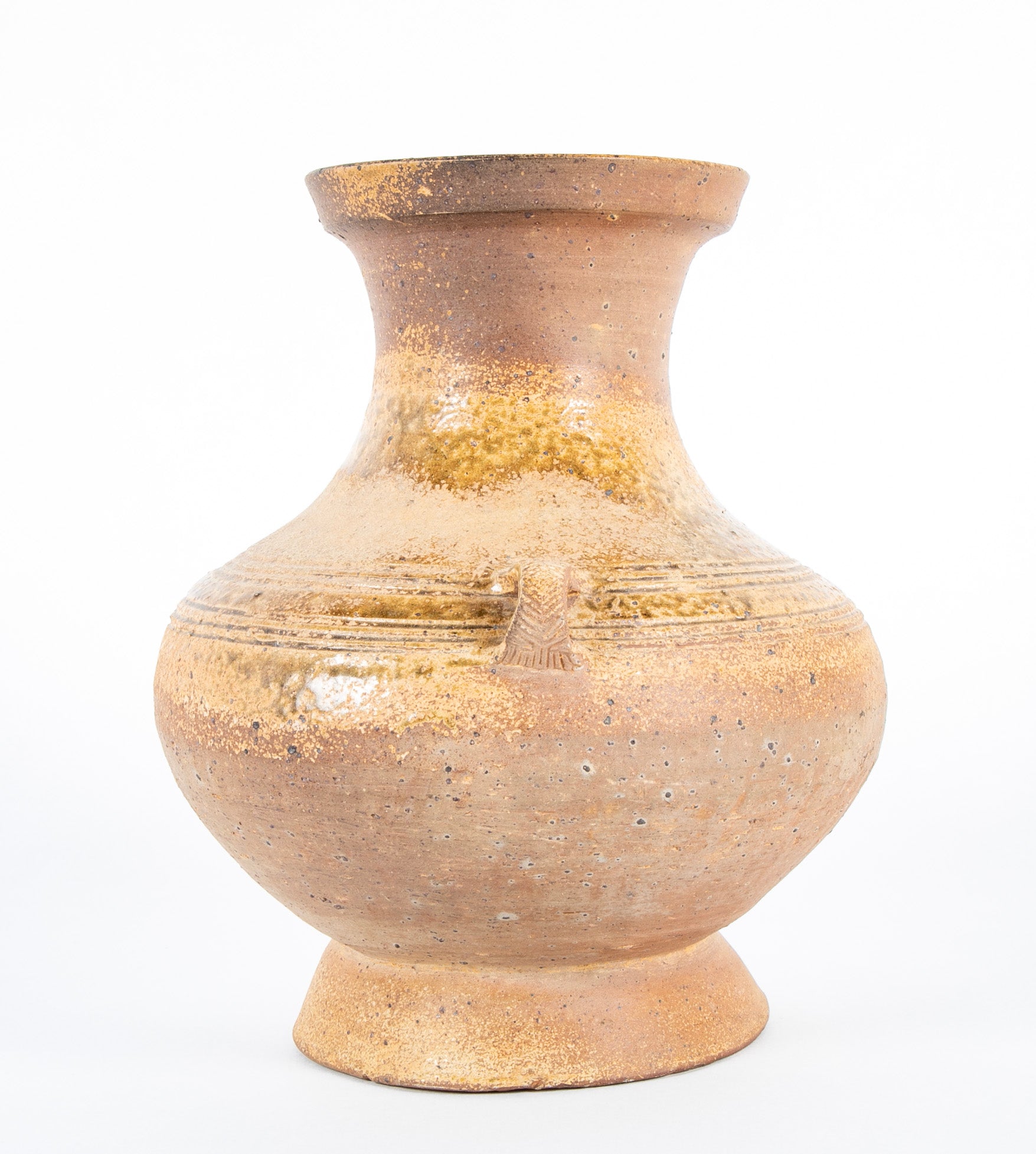 A Tang Dynasty Hu Form Pottery Vase with Loop Handles