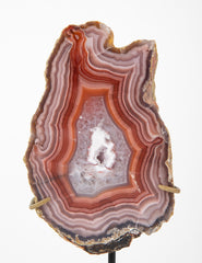 A Split Laguna Agate Geode Now on Two Modern Stands